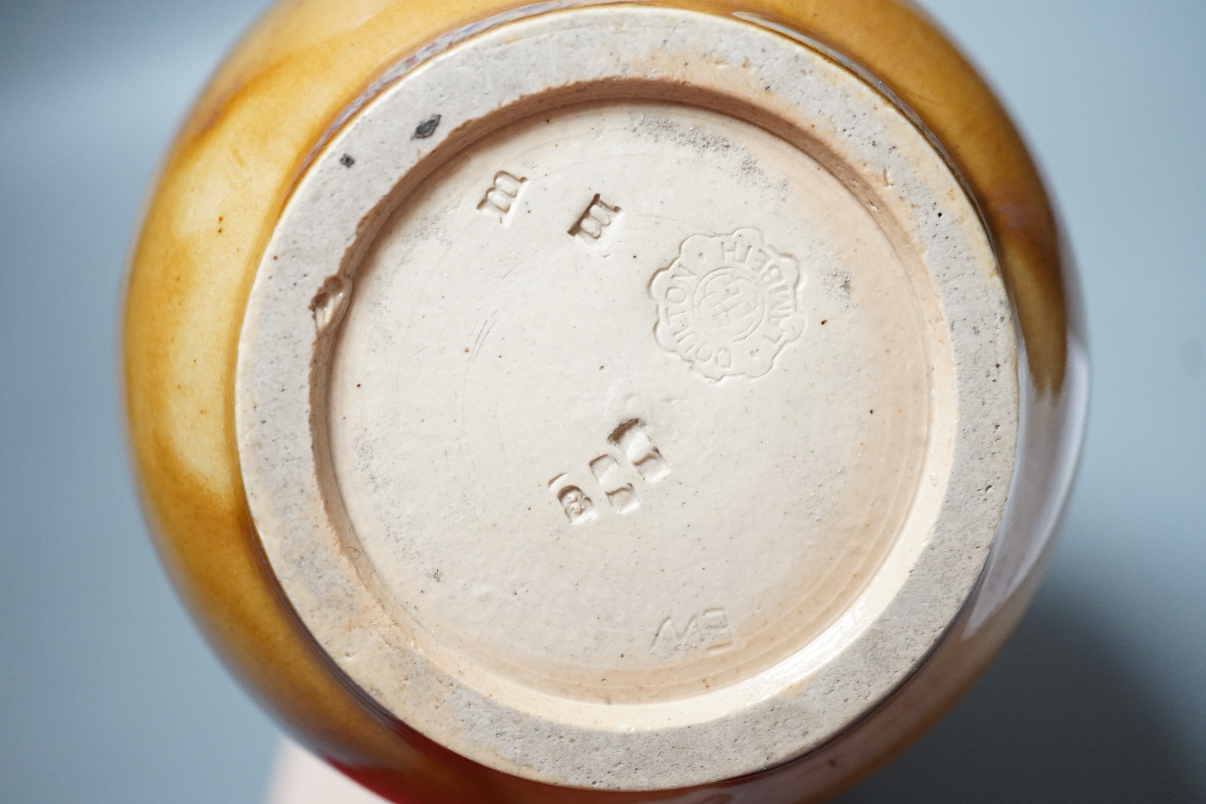 A Doulton Lambeth Aesthetic period stoneware vase, c.1885, decorated with Japanese cartouches and cranes in-flight, 27.5cms high
